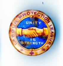Transport and General Workers Union – this badge shows the clasped hands of unity.